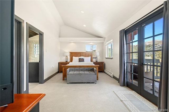 carpeted bedroom featuring french doors, lofted ceiling, and a baseboard heating unit