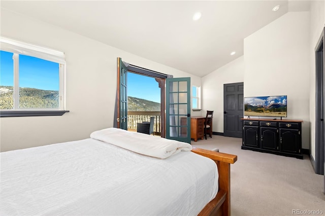 bedroom featuring lofted ceiling, light colored carpet, and access to exterior