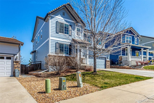 2881 Black Canyon Way, Castle Rock, CO 80109 - view of front facade featuring a garage, a tile roof, and concrete driveway