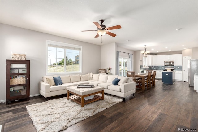 2881 Black Canyon Way, Castle Rock, CO 80109 - living room with baseboards, recessed lighting, dark wood-style floors, and ceiling fan with notable chandelier