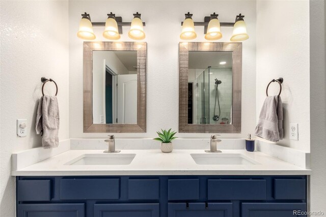 2881 Black Canyon Way, Castle Rock, CO 80109 - bathroom featuring a sink, a shower stall, and double vanity