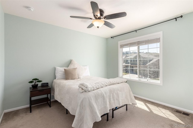 2881 Black Canyon Way, Castle Rock, CO 80109 - bedroom with baseboards, a ceiling fan, visible vents, and carpet flooring