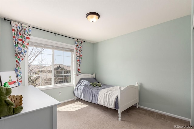 2881 Black Canyon Way, Castle Rock, CO 80109 - bedroom with baseboards and light colored carpet