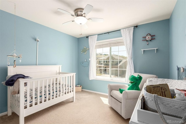 2881 Black Canyon Way, Castle Rock, CO 80109 - carpeted bedroom with ceiling fan, baseboards, and a crib