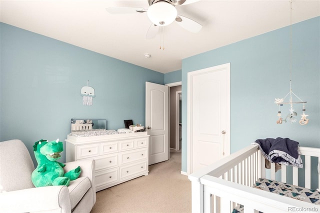 2881 Black Canyon Way, Castle Rock, CO 80109 - bedroom with a nursery area, light carpet, and ceiling fan with notable chandelier