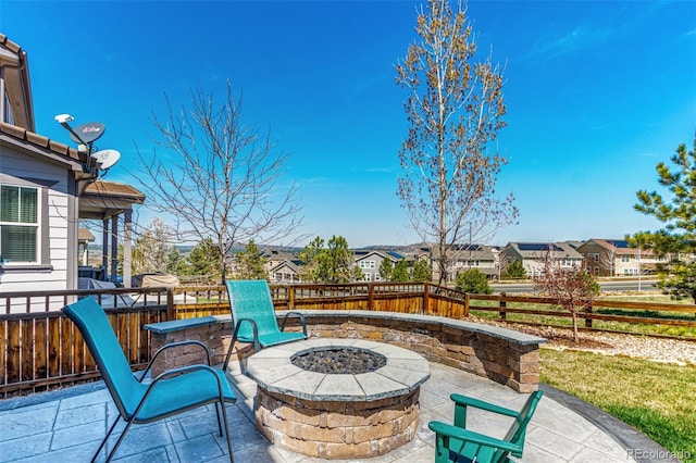 2881 Black Canyon Way, Castle Rock, CO 80109 - view of patio featuring fence, a residential view, and an outdoor fire pit