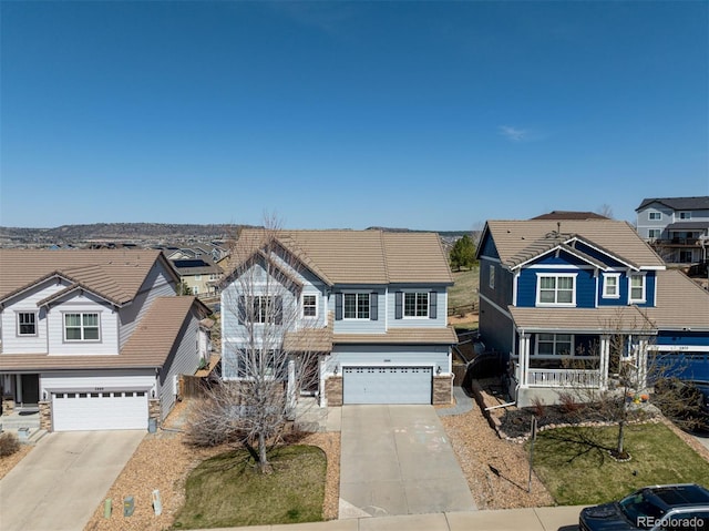 2881 Black Canyon Way, Castle Rock, CO 80109 - traditional home with a residential view, an attached garage, stone siding, and driveway
