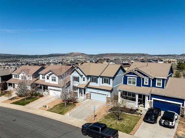 2881 Black Canyon Way, Castle Rock, CO 80109 - view of front of house with concrete driveway, an attached garage, and a residential view
