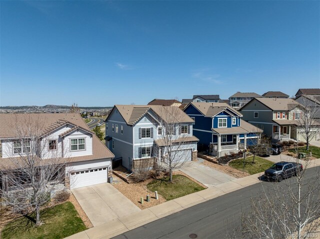 2881 Black Canyon Way, Castle Rock, CO 80109 - view of front of house with a garage and a residential view