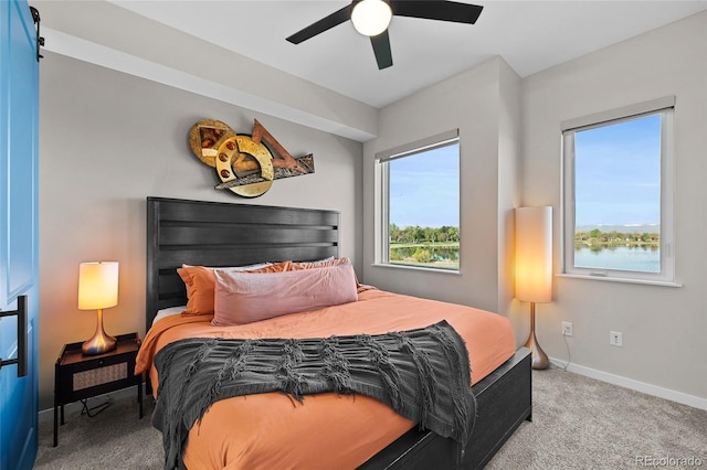 3101 W 47th Ave Unit 13, Denver, CO 80211 - bedroom featuring carpet flooring, baseboards, and ceiling fan