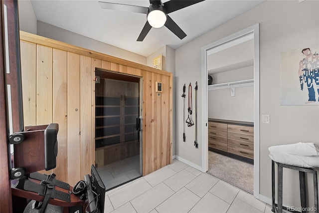 3101 W 47th Ave Unit 13, Denver, CO 80211 - bedroom featuring light colored carpet, ceiling fan, a closet, baseboards, and light tile patterned floors