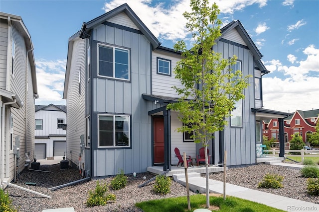 view of front of home featuring cooling unit