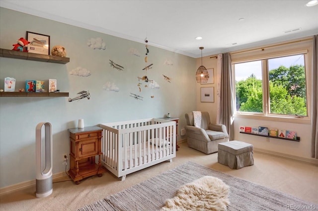2421 Ranch Reserve Rdg, Denver, CO 80234 - carpeted bedroom featuring a crib, recessed lighting, and crown molding