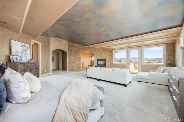 2421 Ranch Reserve Rdg, Denver, CO 80234 - bedroom featuring arched walkways, carpet, and a mountain view