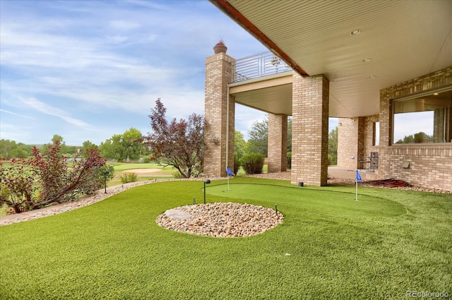 2421 Ranch Reserve Rdg, Denver, CO 80234 - view of green lawn featuring a putting area