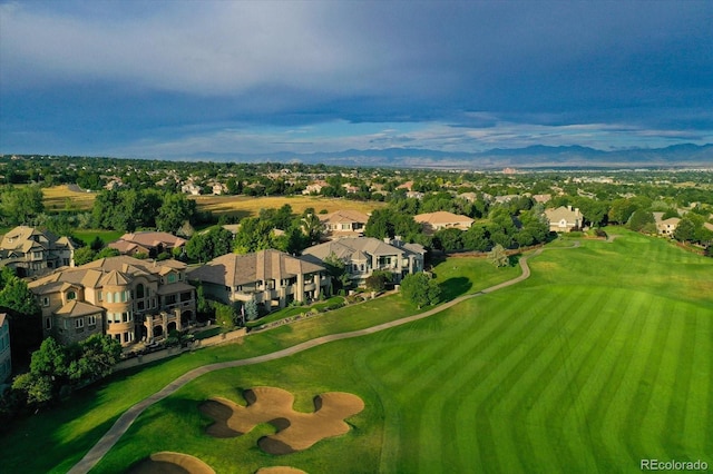 2421 Ranch Reserve Rdg, Denver, CO 80234 - aerial view of residential area featuring a golf course and mountains
