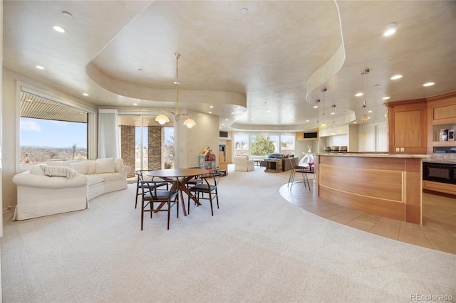 2421 Ranch Reserve Rdg, Denver, CO 80234 - dining room with light carpet, recessed lighting, and light tile patterned flooring