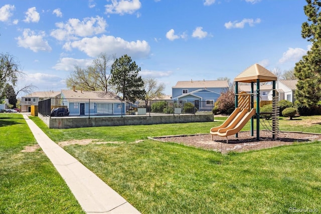 exterior space featuring a yard and fence