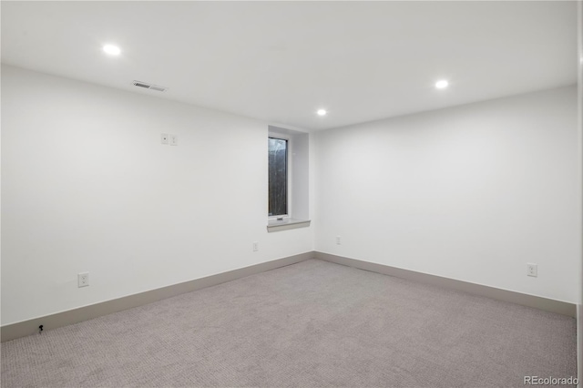 spare room with carpet flooring