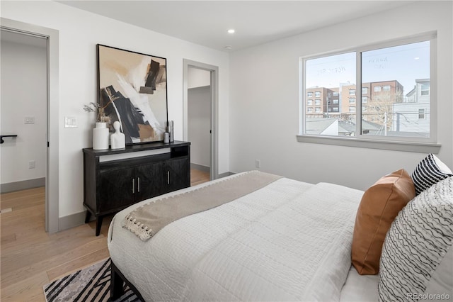 bedroom with wood-type flooring