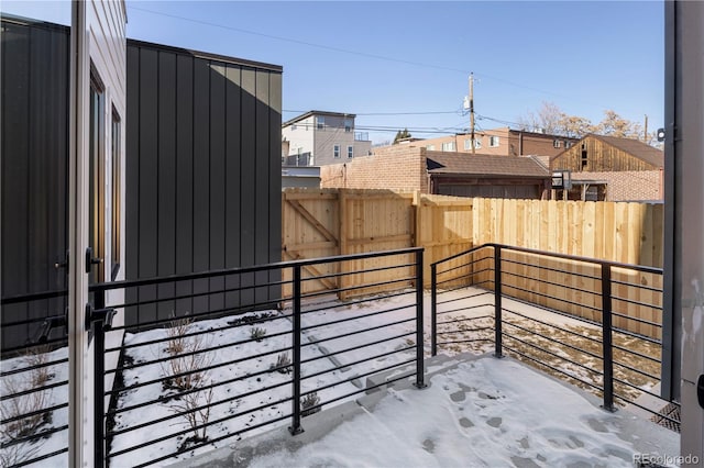 view of snow covered patio