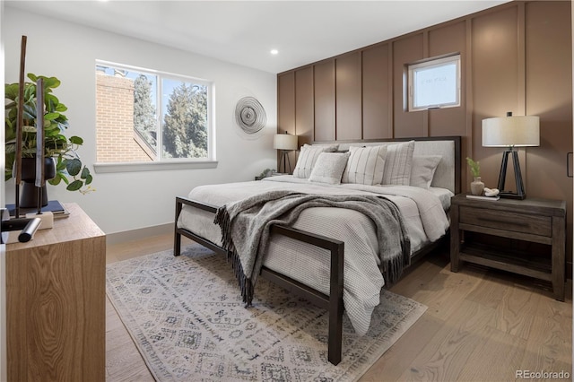 bedroom with light hardwood / wood-style flooring