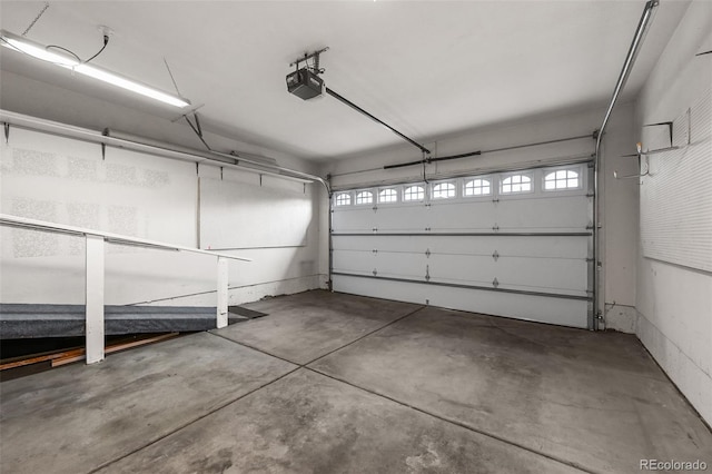 garage featuring a garage door opener