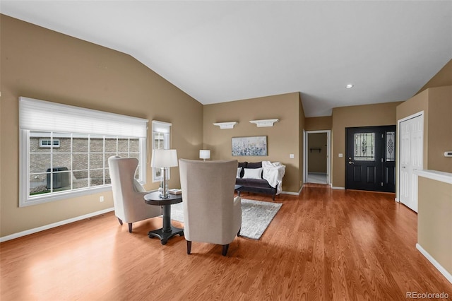 4927 Greenwich Way, Highlands Ranch, CO 80130 - dining space featuring wood finished floors and lofted ceiling