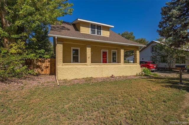 view of front of home featuring a front yard