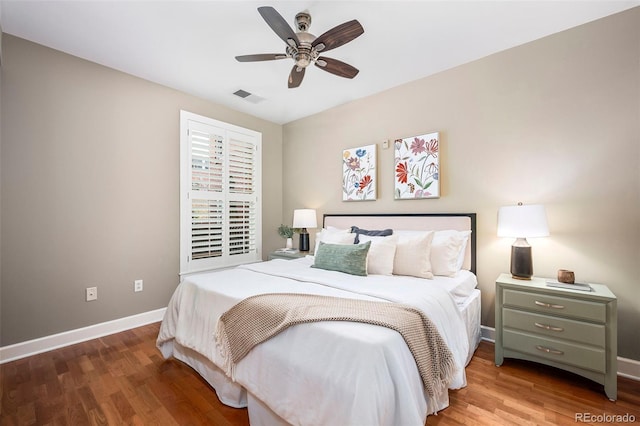 1631 N Emerson St Unit 117, Denver, CO 80218 - bedroom with wood finished floors, visible vents, a ceiling fan, and baseboards