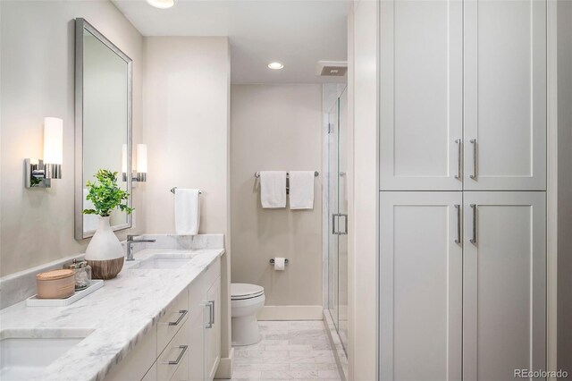 1631 N Emerson St Unit 117, Denver, CO 80218 - full bathroom featuring a sink, toilet, baseboards, marble finish floor, and a shower stall