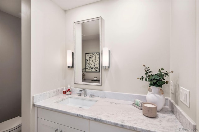 1631 N Emerson St Unit 117, Denver, CO 80218 - bathroom with vanity and toilet