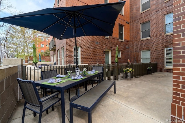1631 N Emerson St Unit 117, Denver, CO 80218 - view of patio / terrace with fence and outdoor dining space