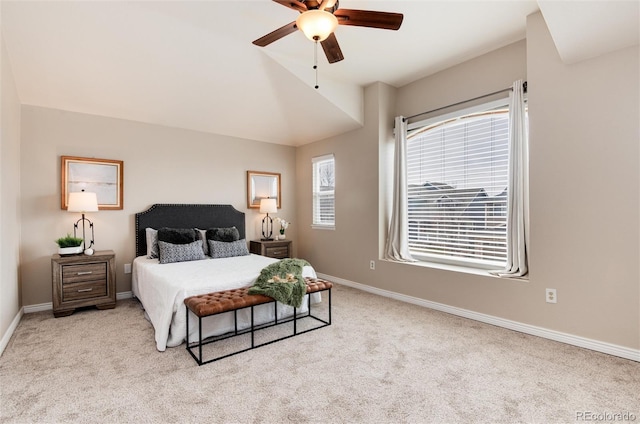 carpeted bedroom featuring a ceiling fan and baseboards