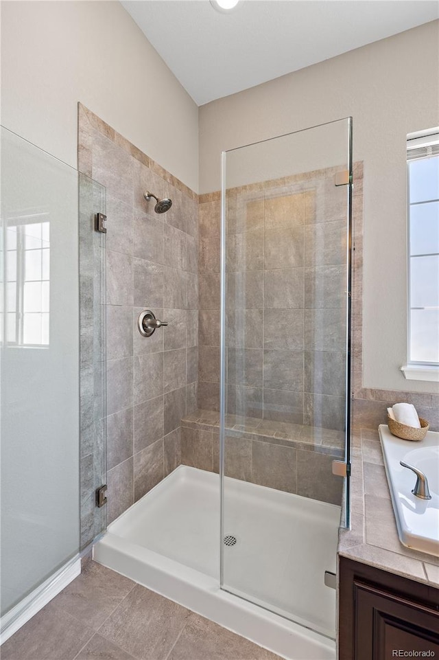 bathroom featuring a stall shower