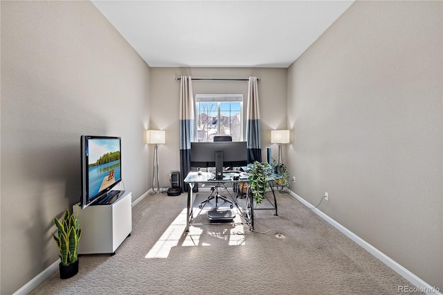 carpeted office with baseboards