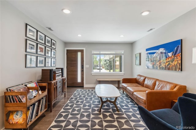 3040 S Dexter Way, Denver, CO 80222 - living area with recessed lighting, wood finished floors, and baseboards