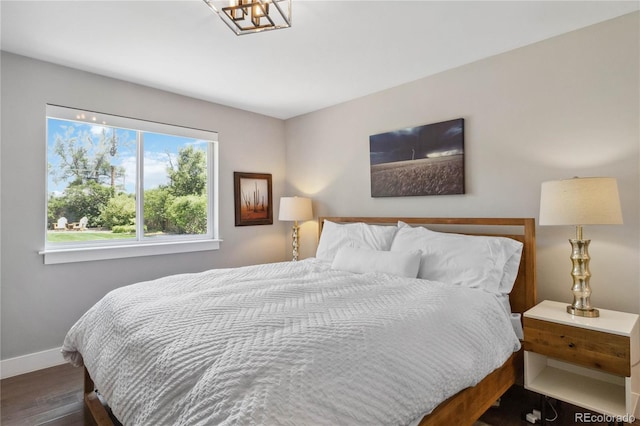 3040 S Dexter Way, Denver, CO 80222 - bedroom featuring baseboards and wood finished floors