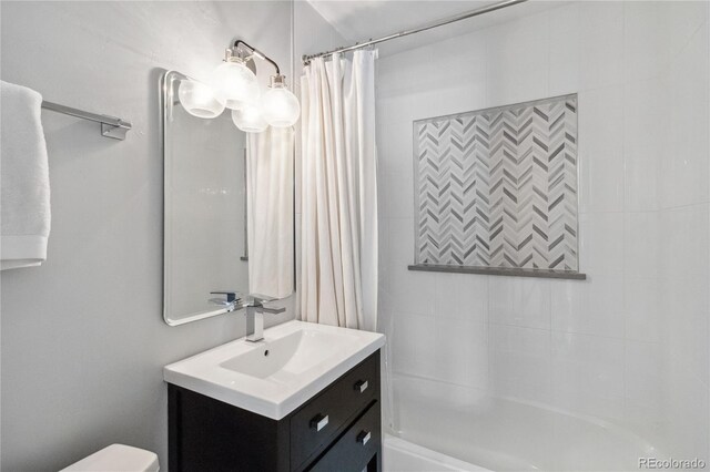 3040 S Dexter Way, Denver, CO 80222 - full bathroom with curtained shower, vanity, and toilet