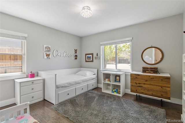 3040 S Dexter Way, Denver, CO 80222 - bedroom with wood finished floors and baseboards
