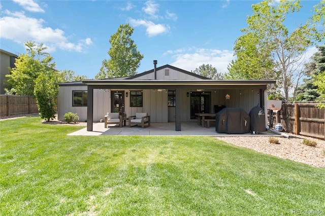3040 S Dexter Way, Denver, CO 80222 - back of house with board and batten siding, a patio area, and outdoor lounge area