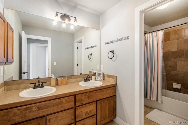 full bath featuring shower / bath combination with curtain, a sink, and double vanity