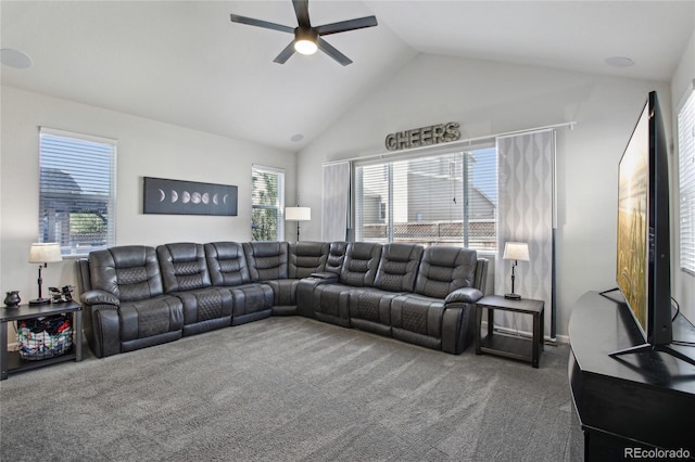living area featuring carpet flooring, ceiling fan, and high vaulted ceiling