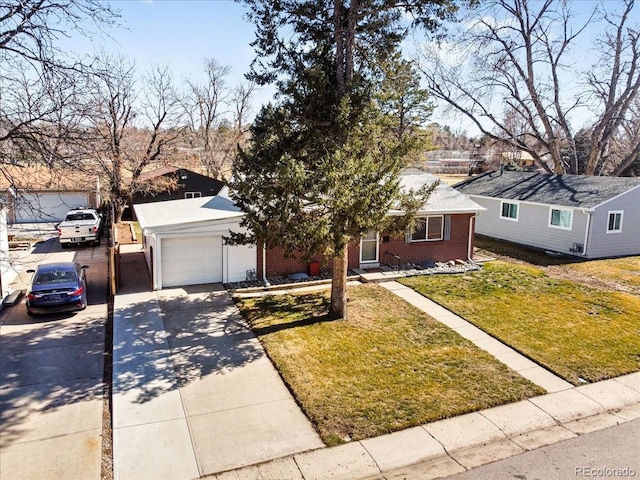 ranch-style house with a front lawn, an attached garage, brick siding, and driveway