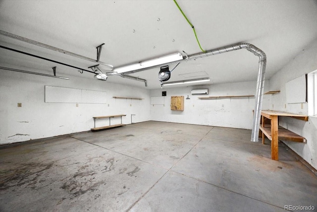 garage featuring a workshop area, a wall mounted AC, and a garage door opener