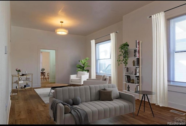 living room featuring dark hardwood / wood-style floors