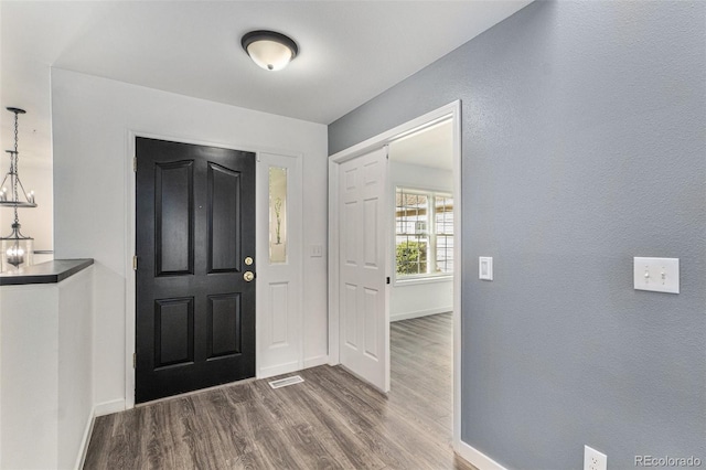 10000 E Yale Ave Unit 58, Denver, CO 80231 - entryway featuring wood finished floors