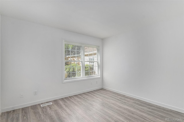 10000 E Yale Ave Unit 58, Denver, CO 80231 - unfurnished room featuring light wood-type flooring