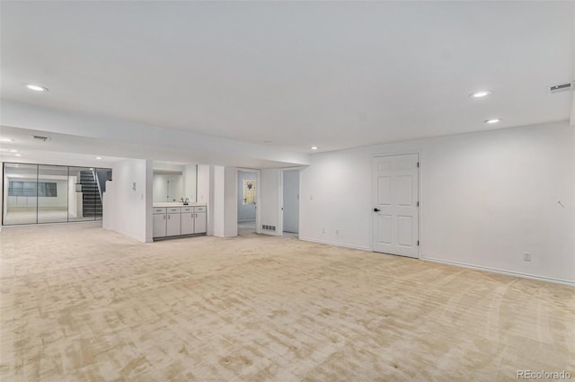 10000 E Yale Ave Unit 58, Denver, CO 80231 - unfurnished room with recessed lighting, light carpet, and stairs