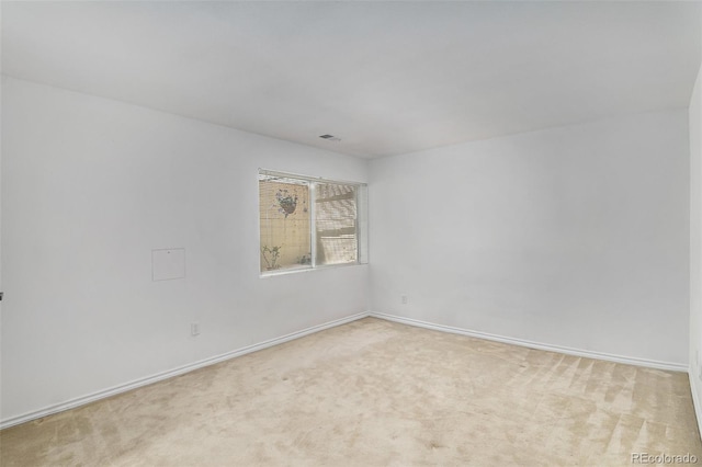 10000 E Yale Ave Unit 58, Denver, CO 80231 - unfurnished room with light carpet and baseboards